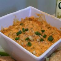 Buffalo Chicken Dip · Chef made spicy buffalo chicken dip comes with tortilla chips for dipping