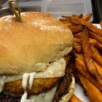 Chef Nick'S  Ranch Burger · A specialty creation of our very own Chef Nick, this burger is topped with Onion Rings, Amer...