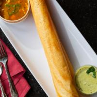 Masala Dosa · South Indian lentil crepe filled with potatoes, onions, ginger, chilies, and spices. Served ...