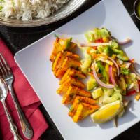 Paneer Tikka · Homemade paneer marinated in yogurt with garlic, ginger, and spices then roasted in the tand...