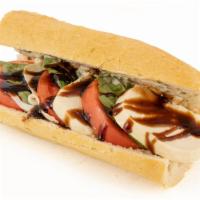 Caprese Baguette · Sliced fresh mozzarella, tomato, and basil, drizzled with balsamic reduction on a Boston bag...