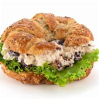 Chicken Salad Croissant · Chicken salad, dried local cranberries, and lettuce on a multigrain butter croissant.