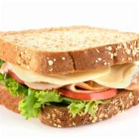 Turkey Breast On Wheat Berry Bread · oven-roasted turkey breast, provolone, mayo, lettuce, and tomato on wheat berry bread.