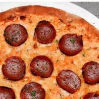 Pepperoni Pizza 12” · Marinara sauce topped with vegan cheese & pepperoni.