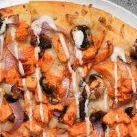 Buffalo Chicken Pizza  8” · Vegan cheese and House made buffalo sauce topped with buffalo chicken, red onions & mushrooms.