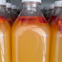 Strawberry Lemonade  · Fresh made juices (32oz)