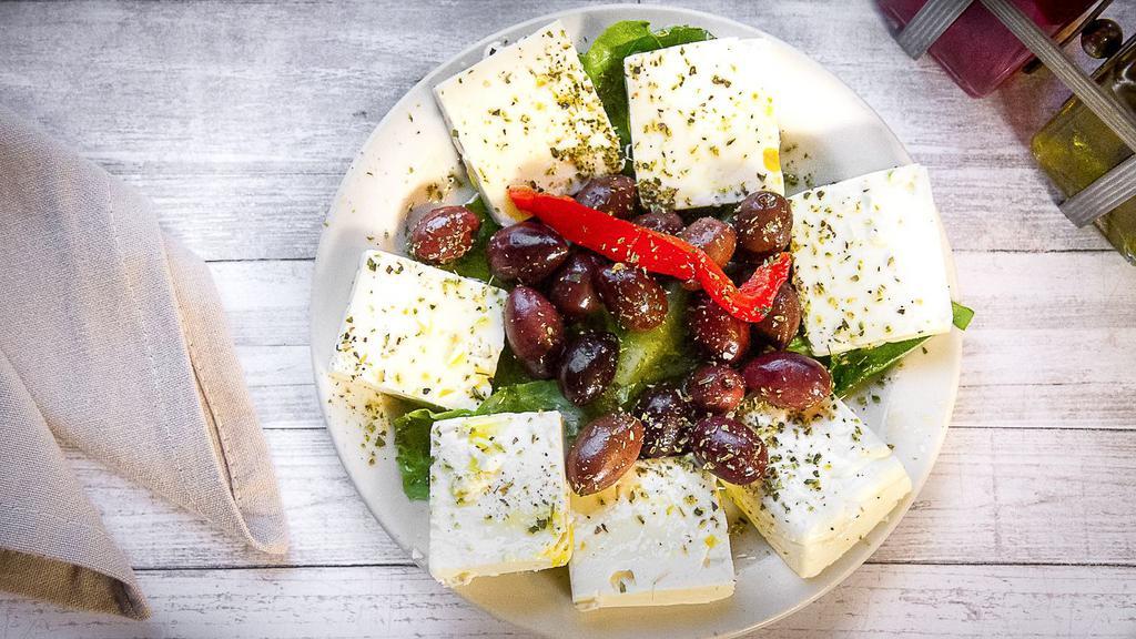 Feta Cheese & Kalamata Olives · Topped with a little oil and oregano.