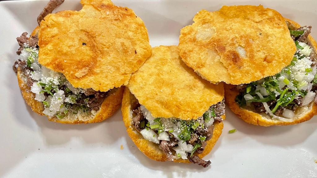 Order Of 3 Gorditas · Homemade corn dough tortilla rounded and thick fried dough cut in half topped with your own choice of meat, cilantro, onions and cheese.