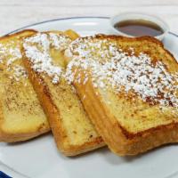 4Pc Classic French Toast · 4pc French Toast Served With Delicious Topping If Liked, Powder Sugar And Syrup On The Side
