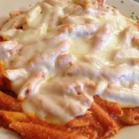 Baked Penne
 · Pencil point pasta. Baked with a blend of tomato sauce, ricotta and Romano cheese, then topp...