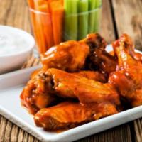 Buffalo Wings · Chicken wings with a crispy breading tossed  in buffalo wing sauce.
Our most popular  award ...