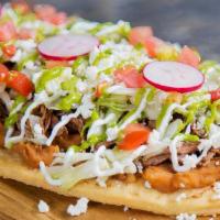 Huarache · Your choice of meat. A red and green salsa, catus cheese, onions, pico and chips.
