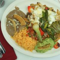 Alambre Iztaccihuatl · Baby shrimp, chicken, steak, onions, red and green peppers served with rice, beans, pico de ...