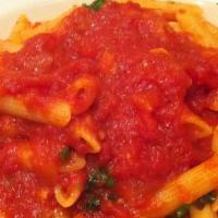 Pasta Con Sugo · Your choice of house tomato, house marinara or garlic and oil.