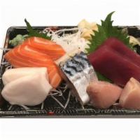 Sashimi Appetizer · 8 pieces of assorted raw fish.