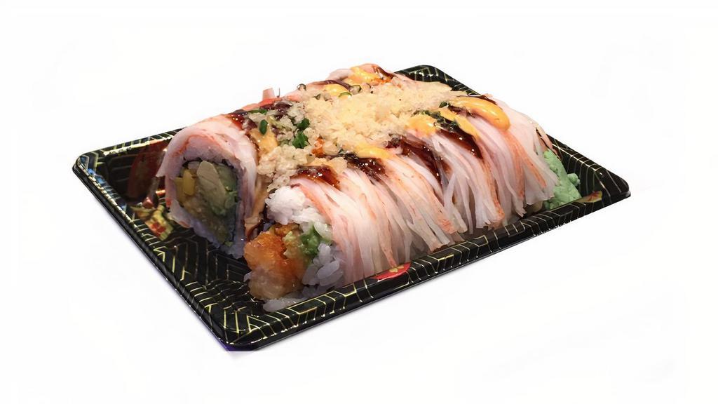 Julia Roll · Oversized. Salmon tempura, mango and avocado inside, topped with kani and crunch. Served with eel sauce, spicy mayo, scallion and fish roe.