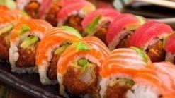 Sumo Special Roll · Crunchy spicy tuna inside, outside tuna, salmon, yellowtail, white fish and topped with eel ...