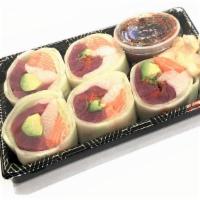 Naruto Roll · Tuna, salmon, yellowtail, avocado and tobiko wrapped in cucumber. (No rice).
