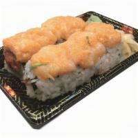 Crystal Roll · Spicy tuna, crunch, avocado, inside, topped with spicy scallop and tobiko.