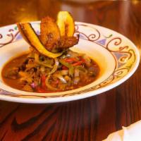 Ropa Vieja · Braised, shredded and stewed beef brisket, tomatoes, bell peppers, onions, red wine, white r...