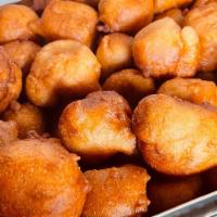 Puff Puff (6Ct) (Only Available On Fridays) · Rich nutmeg flavored fried dough (6 pieces)