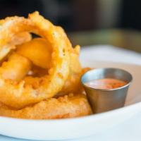 Onion Rings · Deep fried in our homenade beer batter and served with Marie Rose sauce.