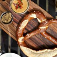 Big Soft Pretzel · Freakishly big Bavarian pretzel with whole grain mustard and a beer cheese sauce.