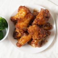 Soy Garlic Wings · Crispy fried chicken wings in sweet and savory Korean soy garlic sauce.