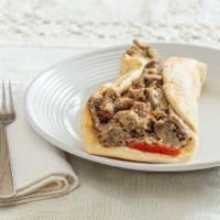 Pork, Chicken Or Lamb & Beef Gyro · Your choice of gyro meat wrapped in a pita sandwich with tomatoes, onions & your choice of c...