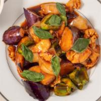 Spicy Basil Eggplant · Chinese eggplant, bell peppers, onions and fresh basil leaves in a spicy basil sauce. Spicy.