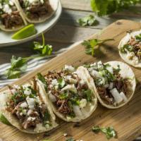 Street Tacos · Three Tacos filled with your choice of main ingredient and wrapped in our fresh Nixtamal tor...