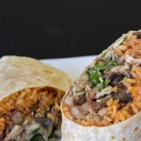 Traditional Burrito · Handheld Burrito.  Choice of main ingredient.  Stuffed with rice, beans, lettuce, cheese, so...