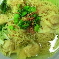 Wonton Noodle Soup · Egg noodles served with napa and wonton in a clear broth.