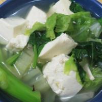Tofu Vegetable Soup · Fresh, soft tofu with mixed vegetables in clear broth.