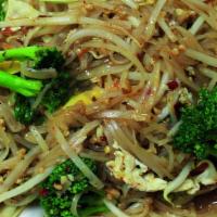 Vegetable Basil Pad Thai · Stir-fried flat rice noodle with mixed vegetables, basil leaves, egg, bean sprouts  with gro...