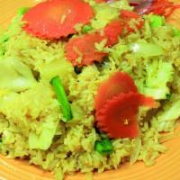 Vegetable Pineapple Fried Rice · Stir-fried with mixed vegetables, pineapple chunks, onion egg, and curry powder.
