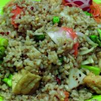 Tofu Vegetable Brown Rice · Stir-fried with brown rice with fried tofu and mixed vegetables, onion and egg.