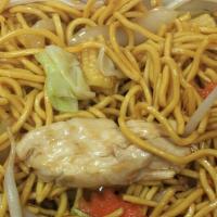 Lomein Noodles · Stir-fried egg noodle cooked in oyster sauce with mixed vegetable in hot and chili paste and...