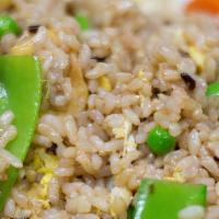 Brown Fried Rice · Brown rice with egg, onion with mixed vegetables.