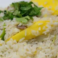 Mango Fried Rice · Fried rice with mangoes, egg, and mixed vegetables.
