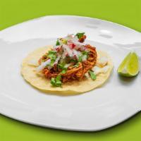 Taco · One fresh handmade corn tortilla, onions, cilantro, and radish.