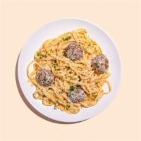 Penne Alfredo With Meatballs · Four meatballs over penne with Nonna's alfredo and fresh Parm.