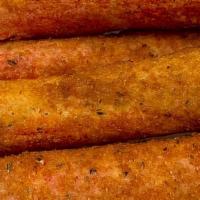 Fried Crab Sticks · 5 pieces. Imitation crab meat breaded and deep-fried to a golden crispy.
