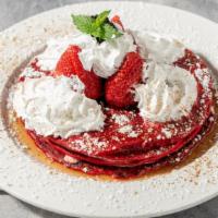 Red Velvet Pancakes · Four Red Velvet Pancakes, Mascarpone Cheese Frosting, topped with Whipped Cream, Strawberrie...