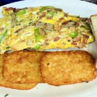 Meat Lover Omelet Platter · Choice of two breakfast meat, onion and green pepper omelet. Served with toast. Choice of gr...