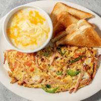 Western Omelet Platter · Ham, onion, green pepper and tomato omelet served with toast. Choice of potatoes.