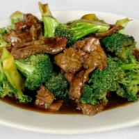 Beef With Broccoli · 芥蘭牛肉 — Sliced beef with broccoli florets, in brown sauce.