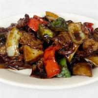 Beef With Black Bean Sauce · 豉椒牛肉 — Beef sautéed with peppers and onions, in a rich black bean sauce.