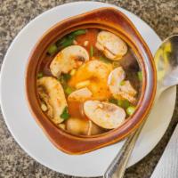 Tom Yum Goong · Hot and spicy. Hot and sour soup with shrimp, lemongrass, scallions, kaffir lime leaves, lim...