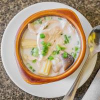 Tom Khar Gai · Chicken in Thai coconut soup with lemongrass, galangal, baby corn, and mushrooms.
